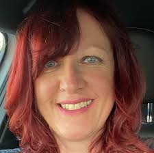 Channel for Archangel Metatron and color therapist offering aura sprays and angelic transmissions for spiritual healing.