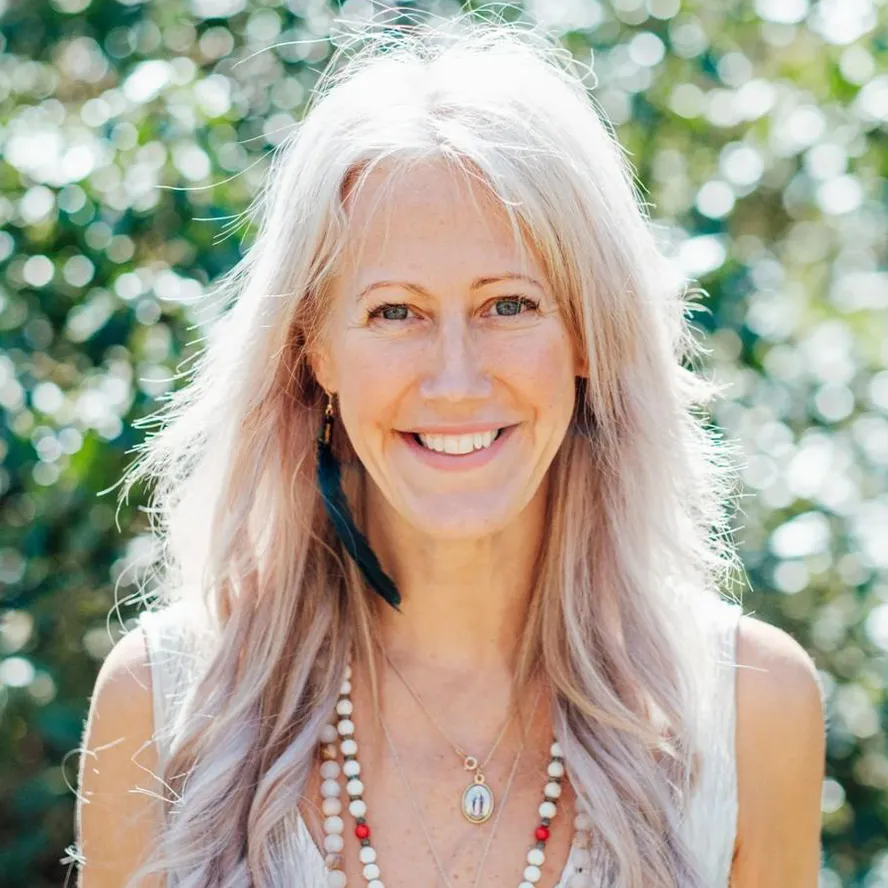 Healer and teacher weaving yoga, plant medicine, and ceremony into deep soul initiation and sacred community embodiment.