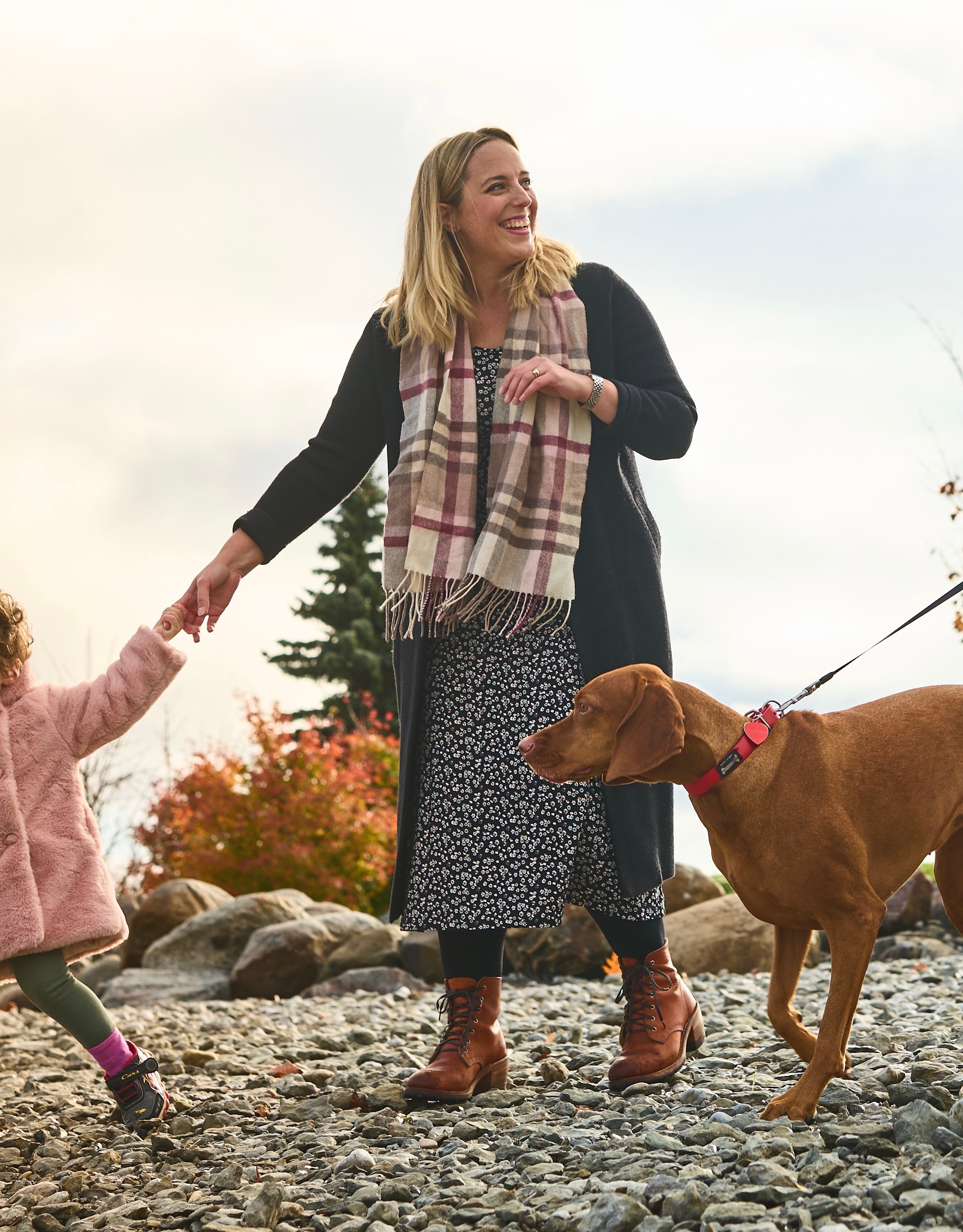 Laura Beattie walking with her child and dog