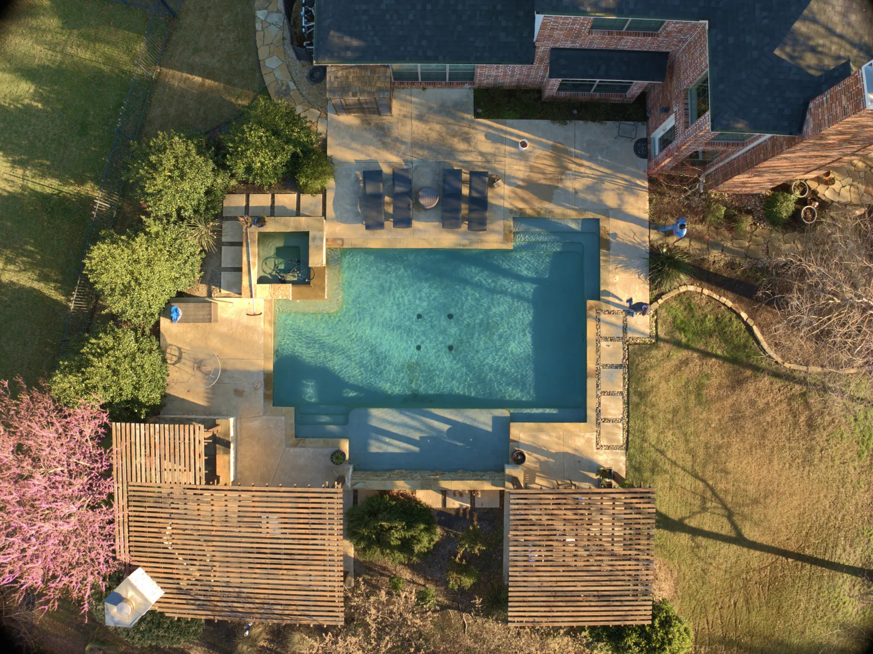 An awesome drone shot of a pool that we turned from green to blue.