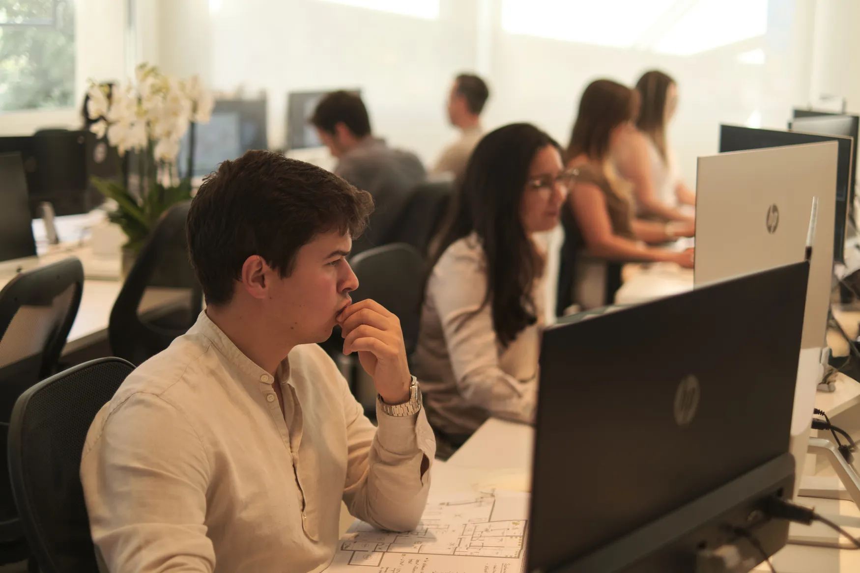 Staff at AMES in a collaborative workspace.