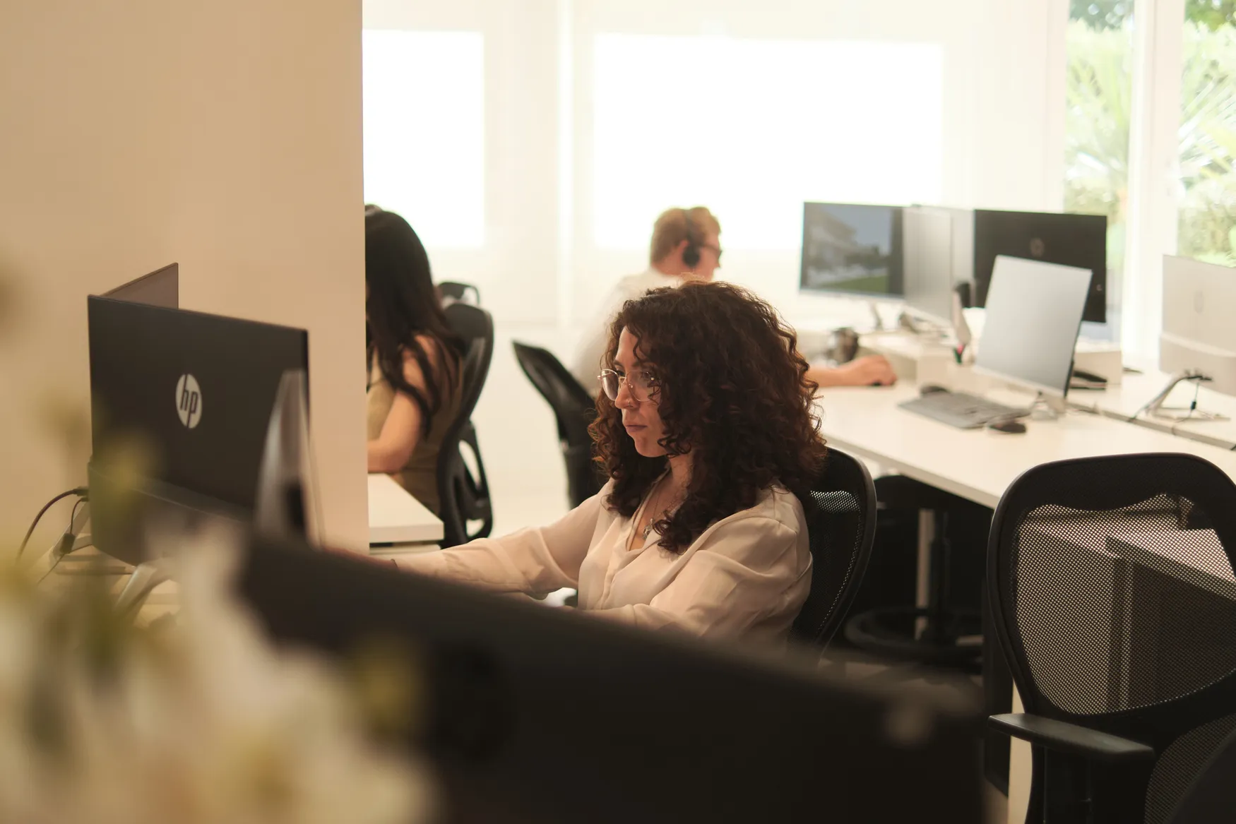 Staff at AMES in a collaborative workspace.