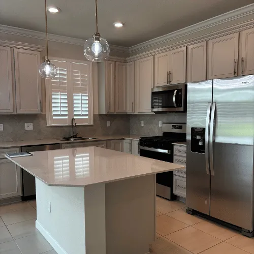 Sparkling clean and reflective kitchen counters with shining stainless steel