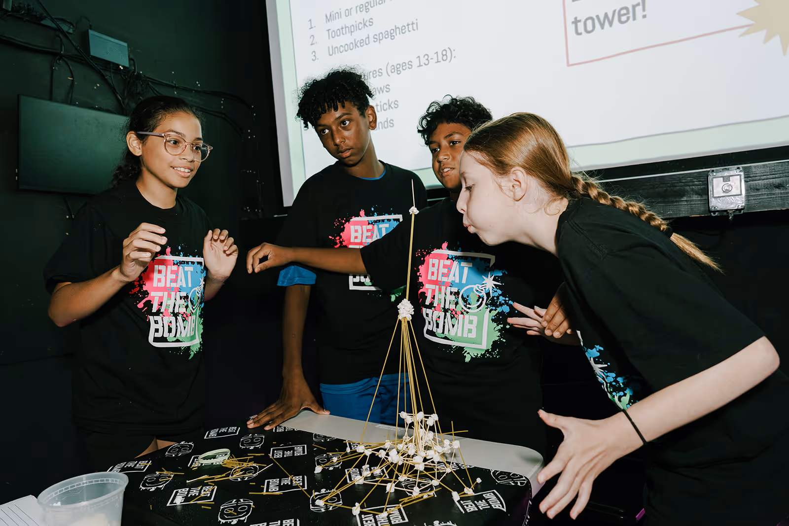 Ka-Boom campers building a spaghetti marshmallow tower