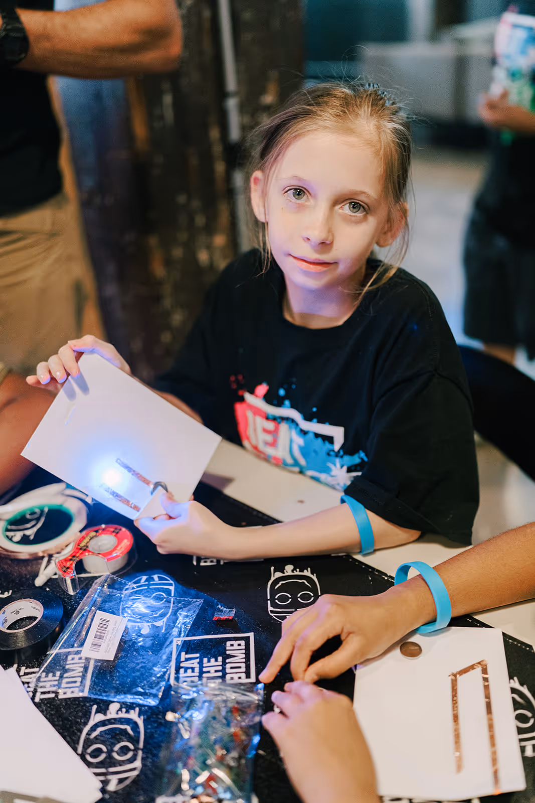 Ka-Boom camper posing with their LED craft drawing