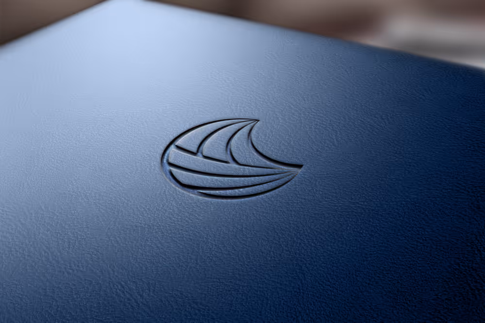 A close up of a laptop with a logo on it