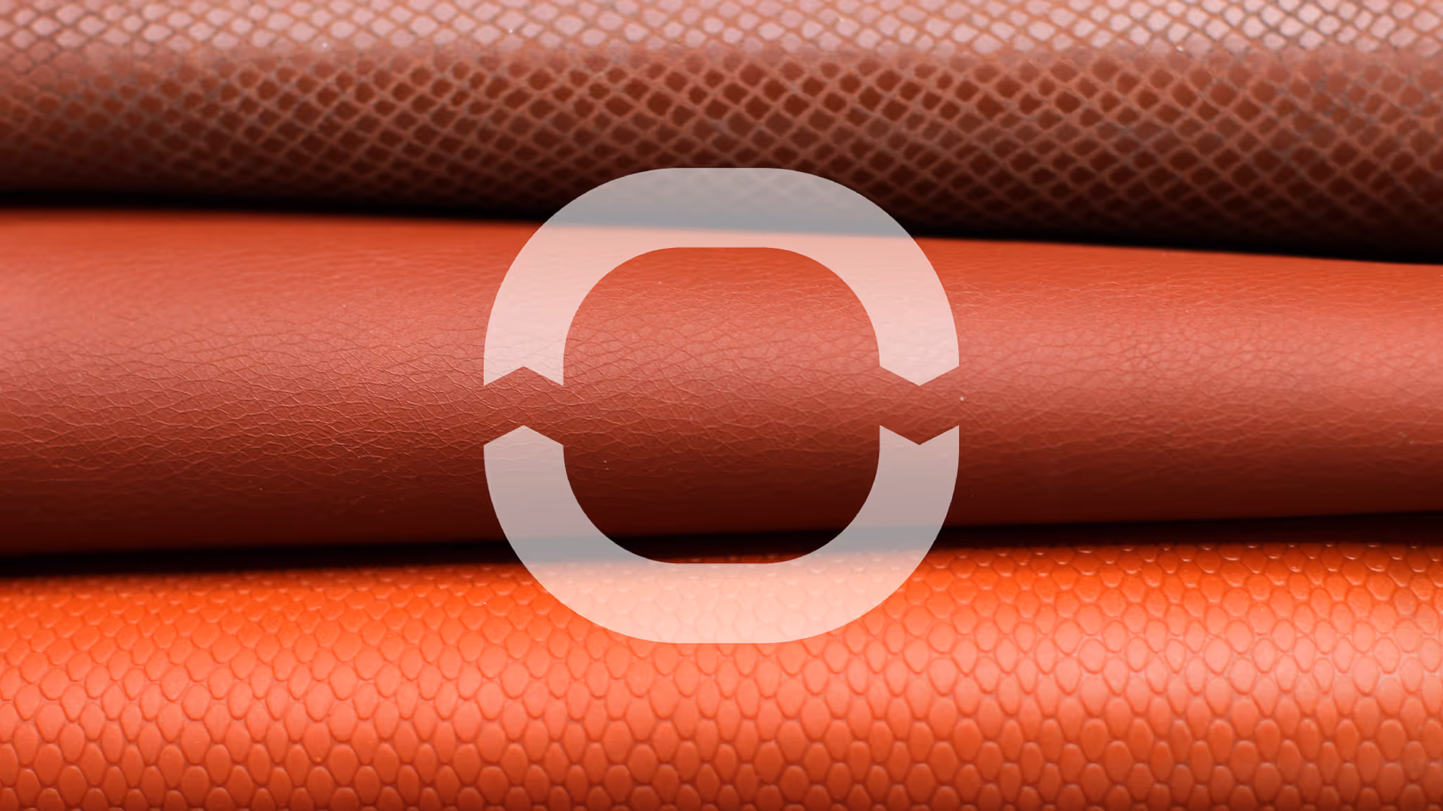 A close up of a red leather texture
