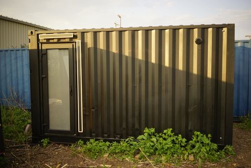 exterior photograph of model a shipping container sauna