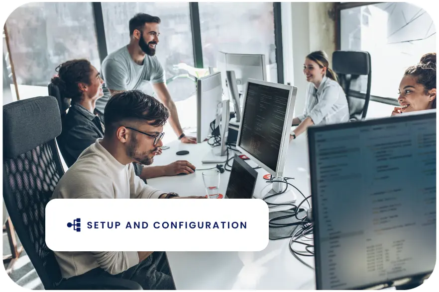A group of professionals working with the text: Setup and Configuration.
