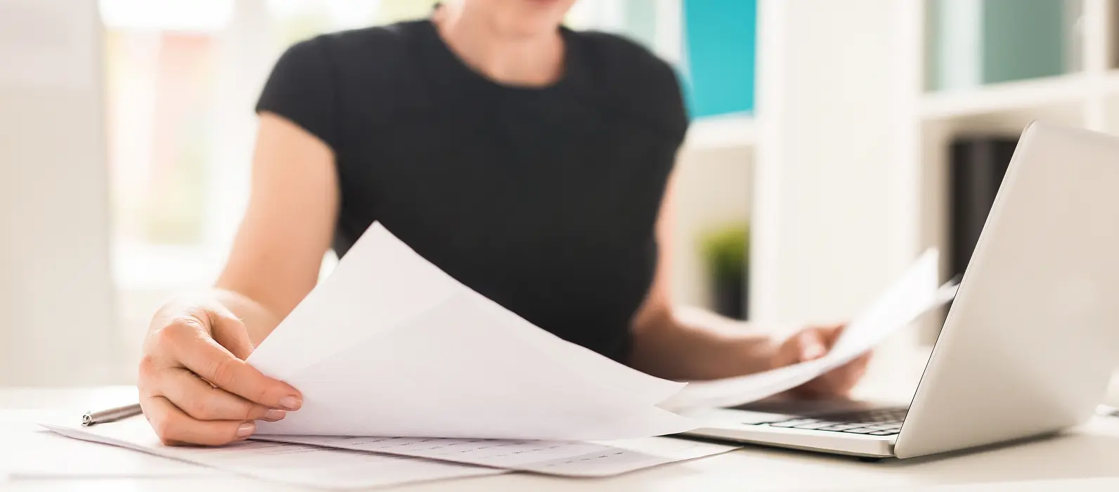 Woman looking at papers
