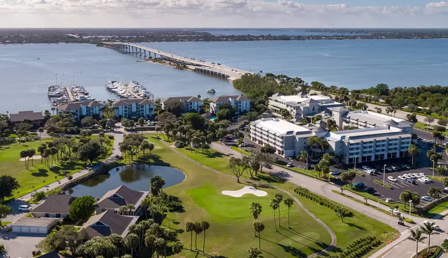 Aerial photograph of resort's waterfront property and golf course