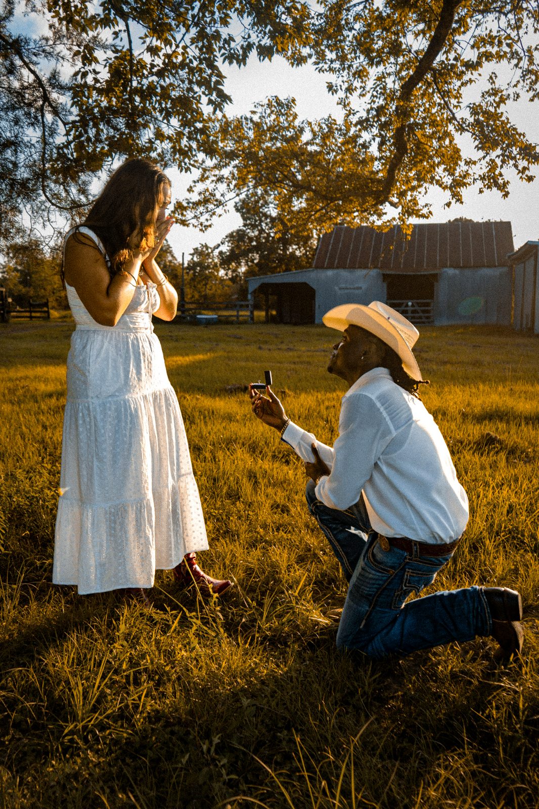 Golden-hour proposal on a Texas ranch