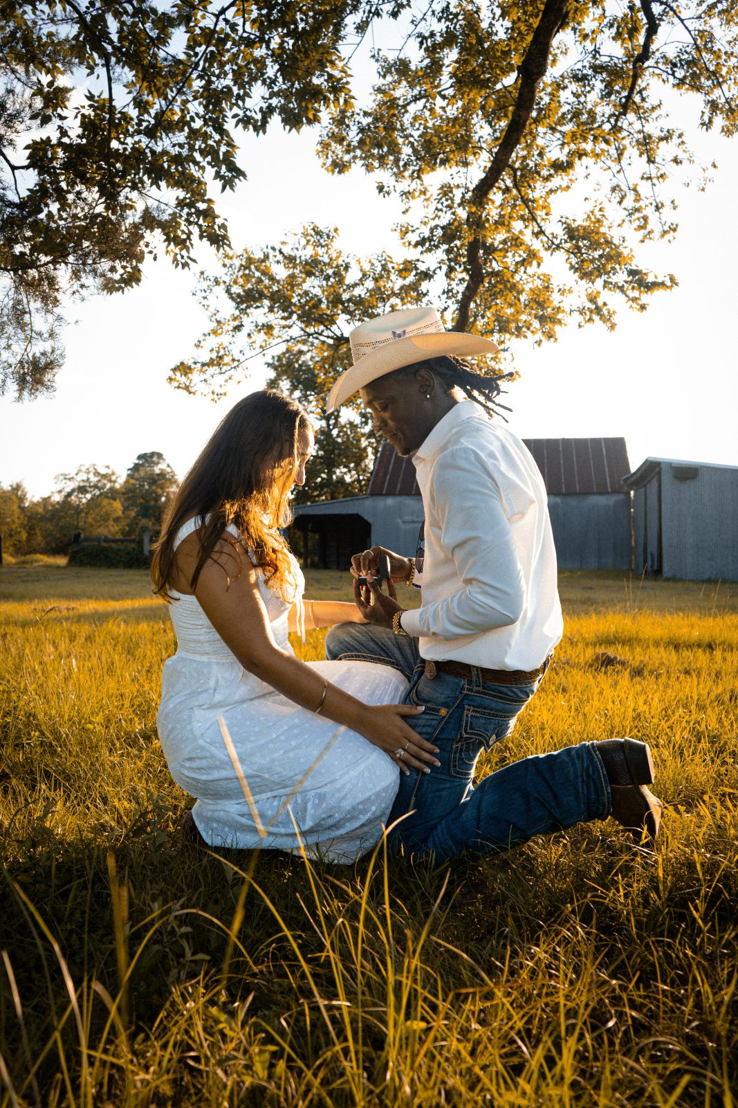 Golden-hour proposal on a Texas ranch