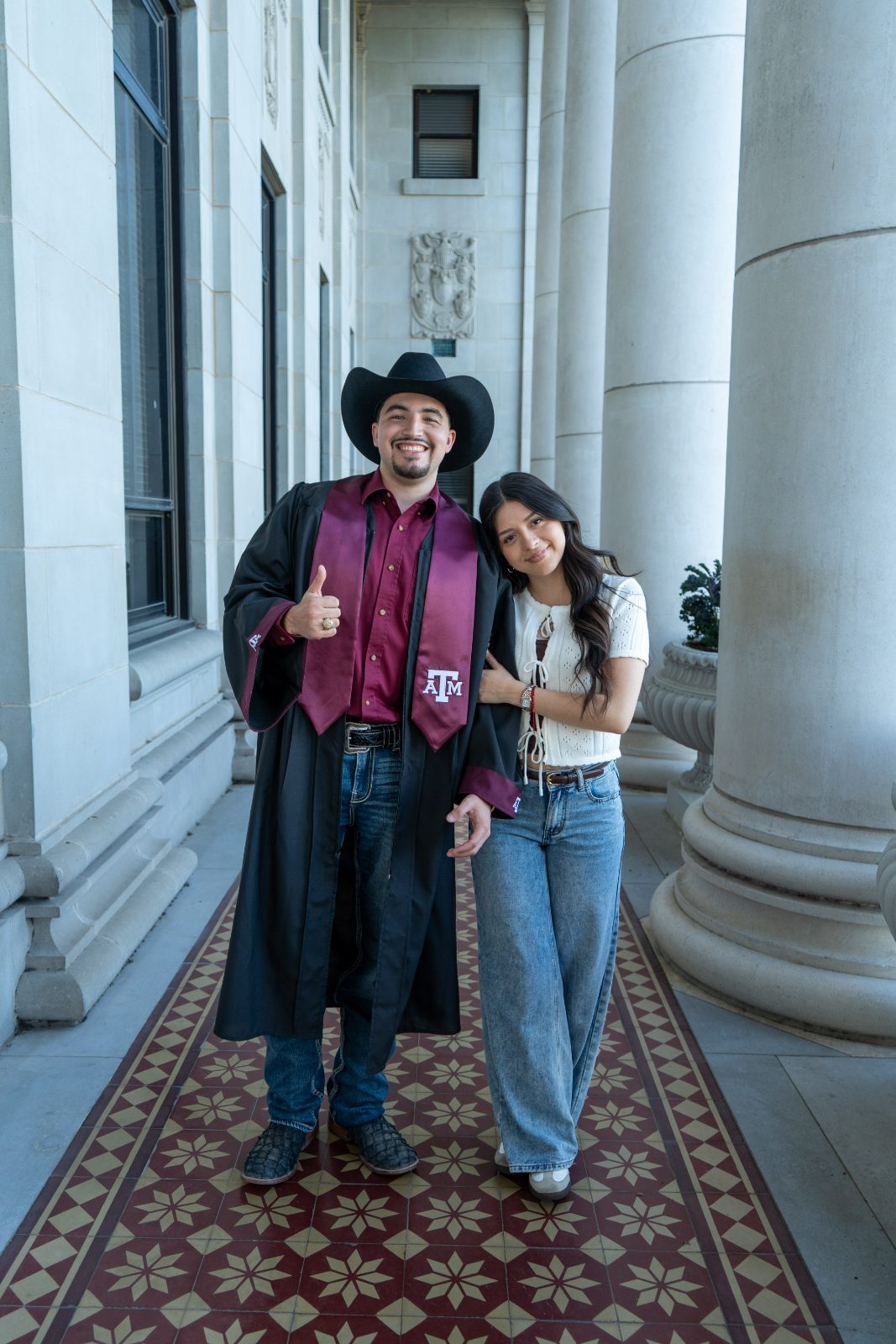 Graduation portraits under the Academic Building colonnade, Texas A&M