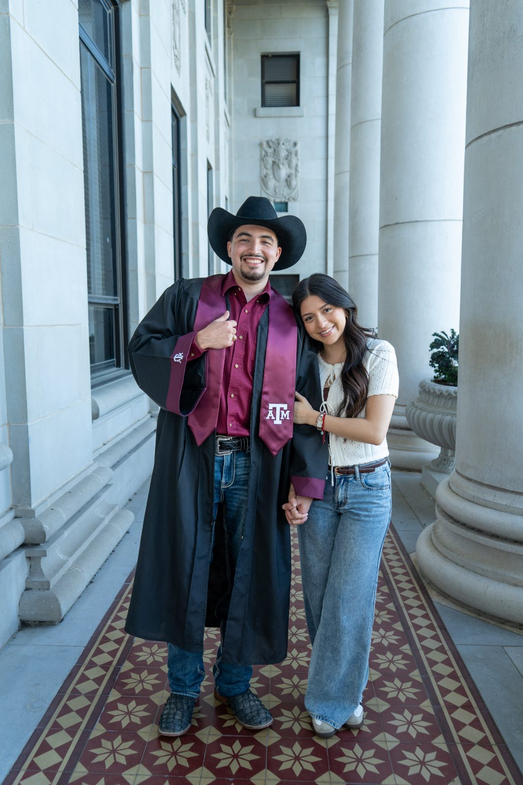 Graduation portraits under the Academic Building colonnade, Texas A&M