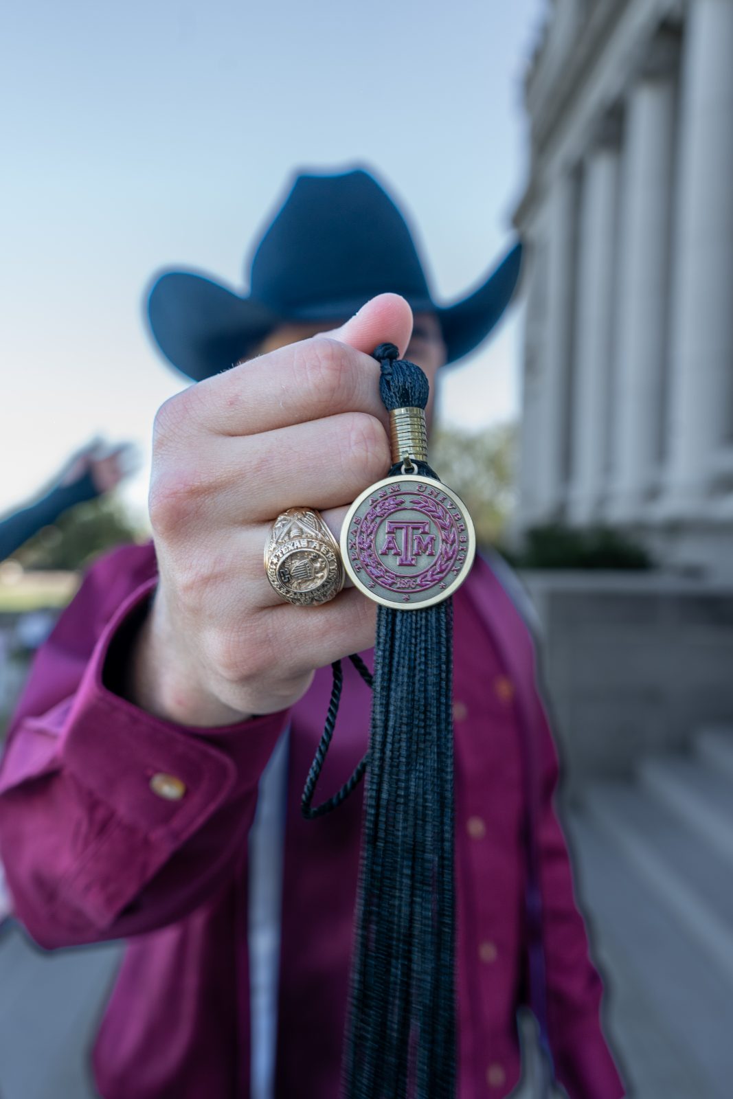 Graduation portraits under the Academic Building colonnade, Texas A&M
