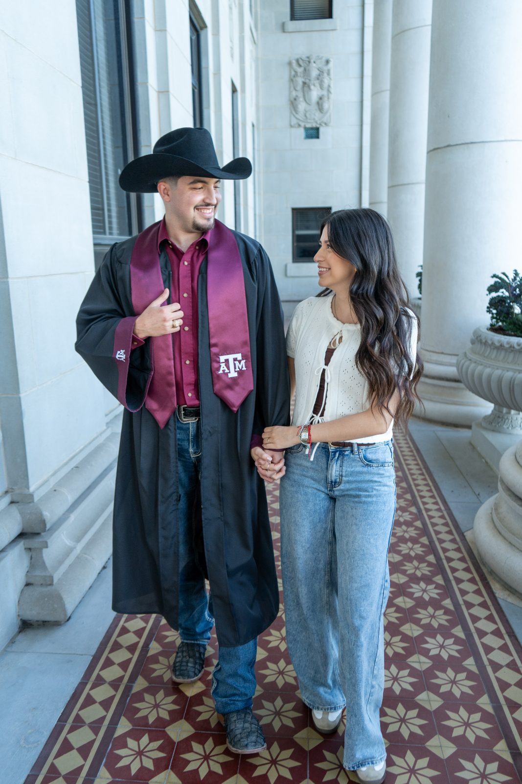 Graduation portraits under the Academic Building colonnade, Texas A&M
