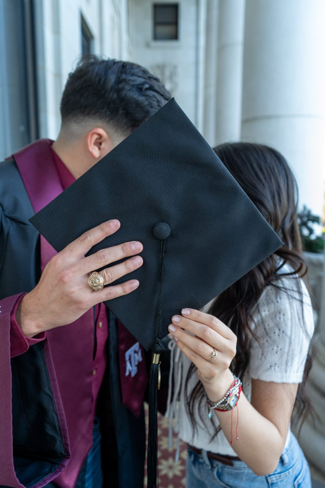 Graduation portraits under the Academic Building colonnade, Texas A&M