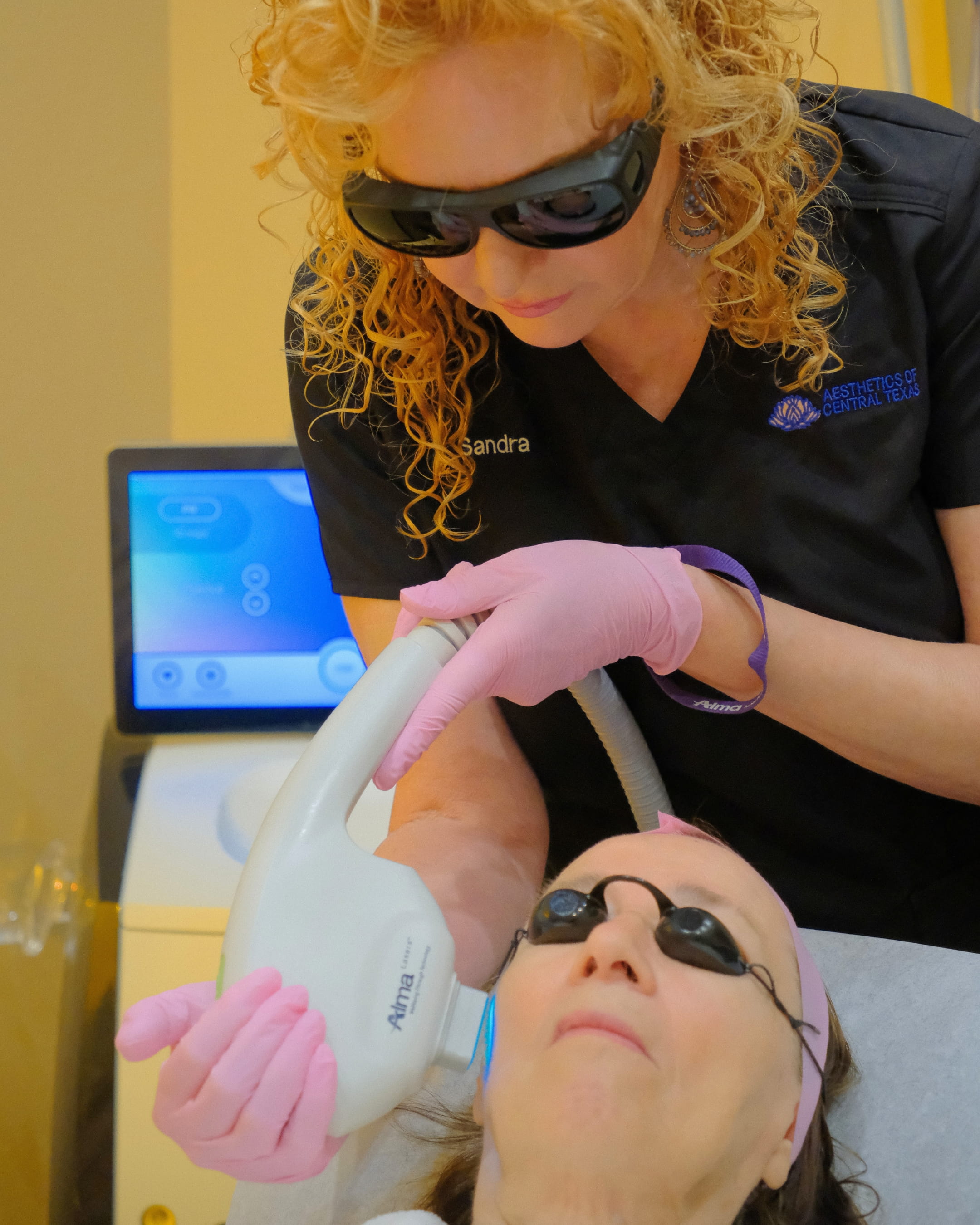 Photofacial treatment to address hyperpigmentation from dark spots or sun damage.