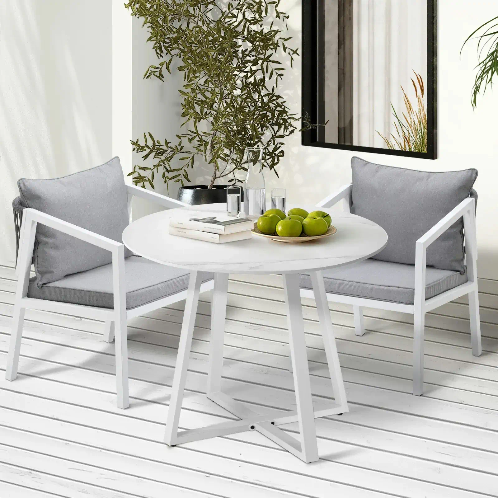 a table and chairs on a deck
