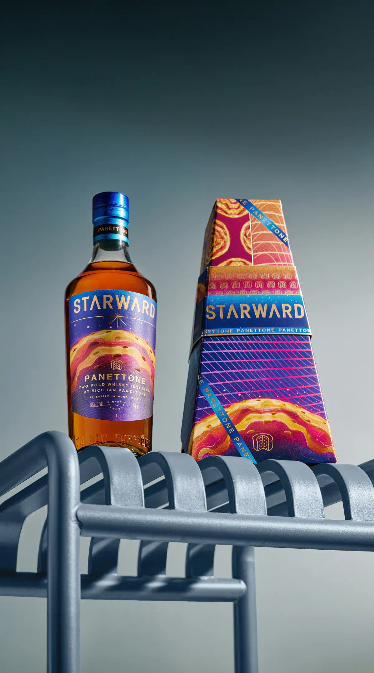 a bottle of alcohol next to a box