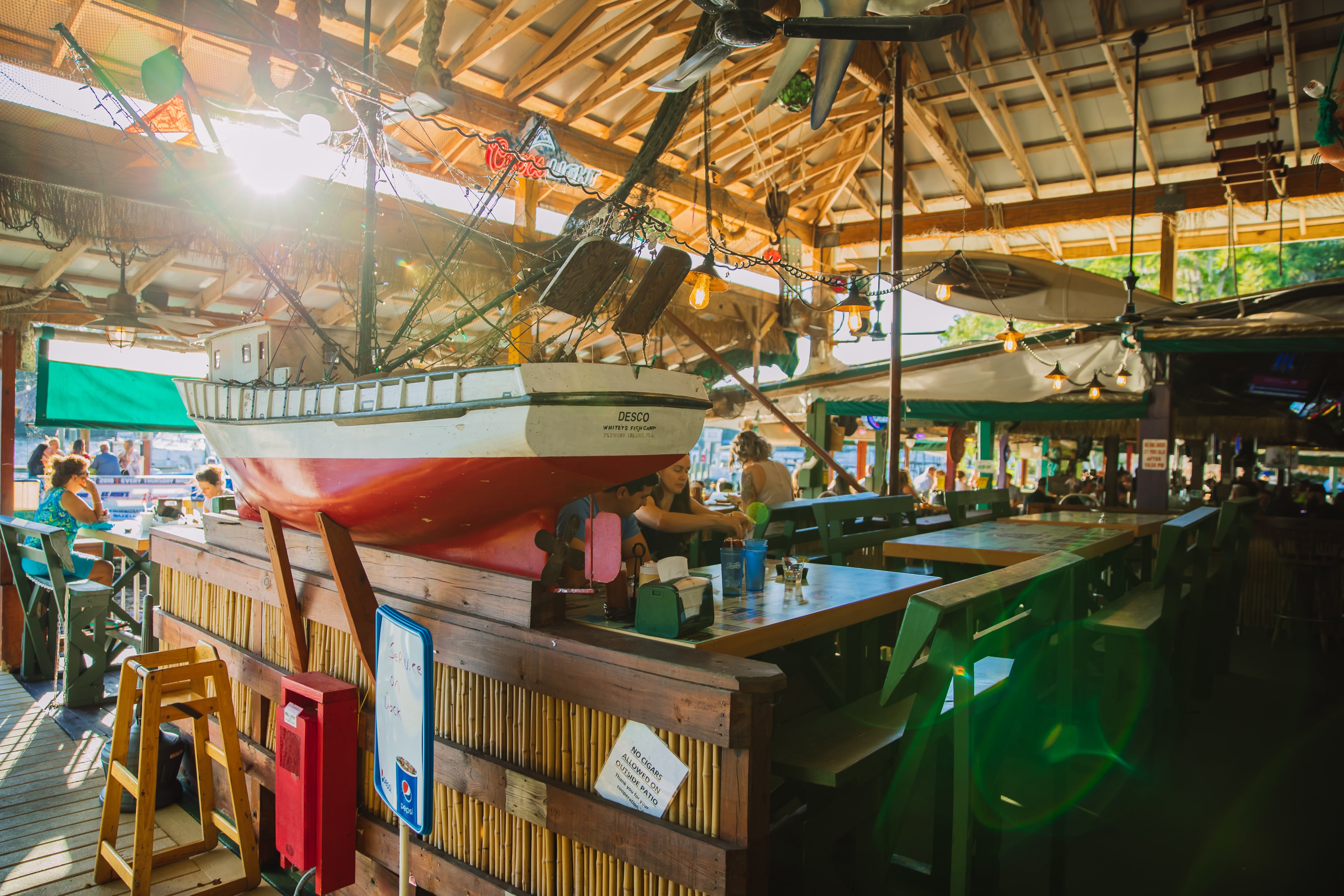 A boat is on display in a store