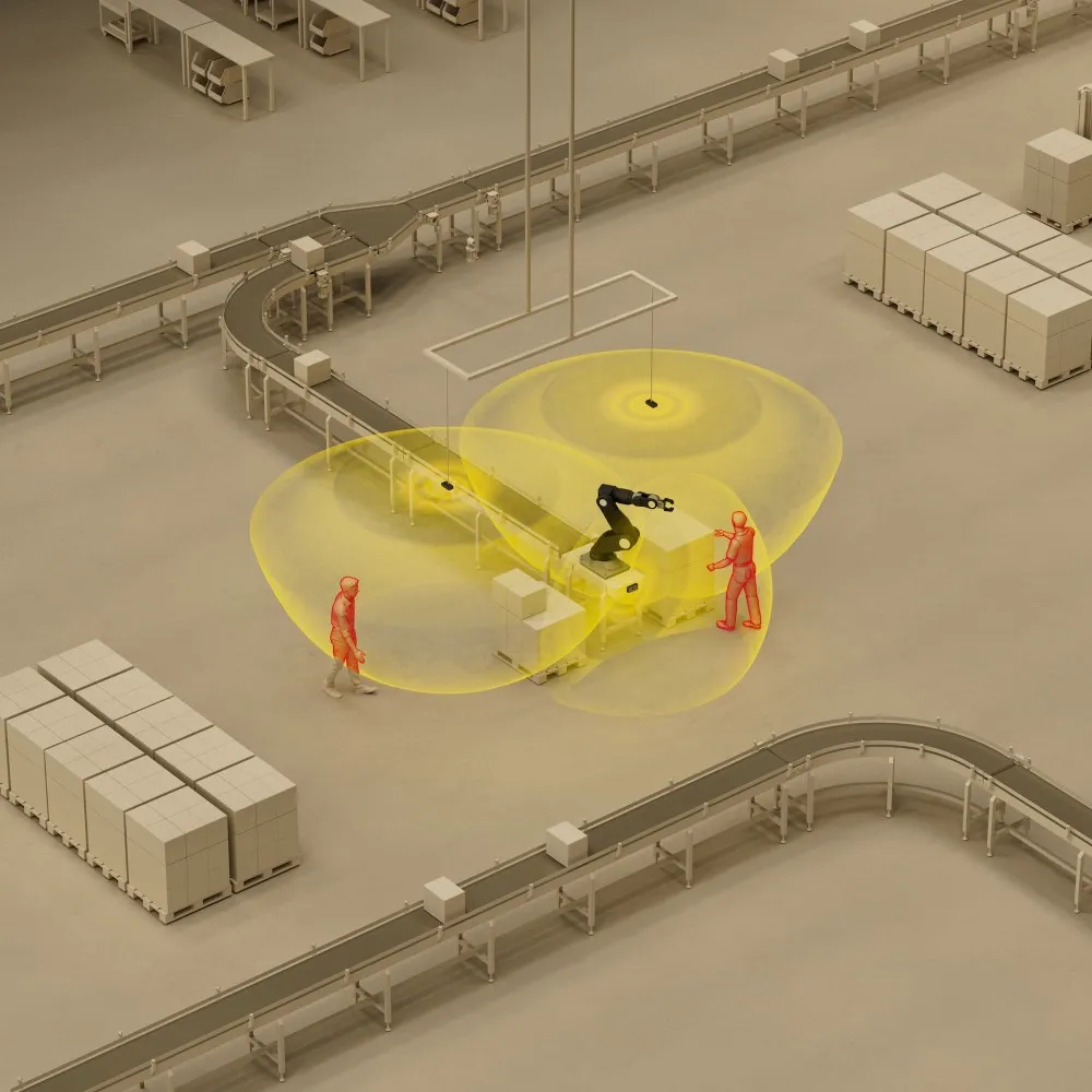 Illustration showing 3 ADAR sensors around a robot hand, safely detecting working humans.
