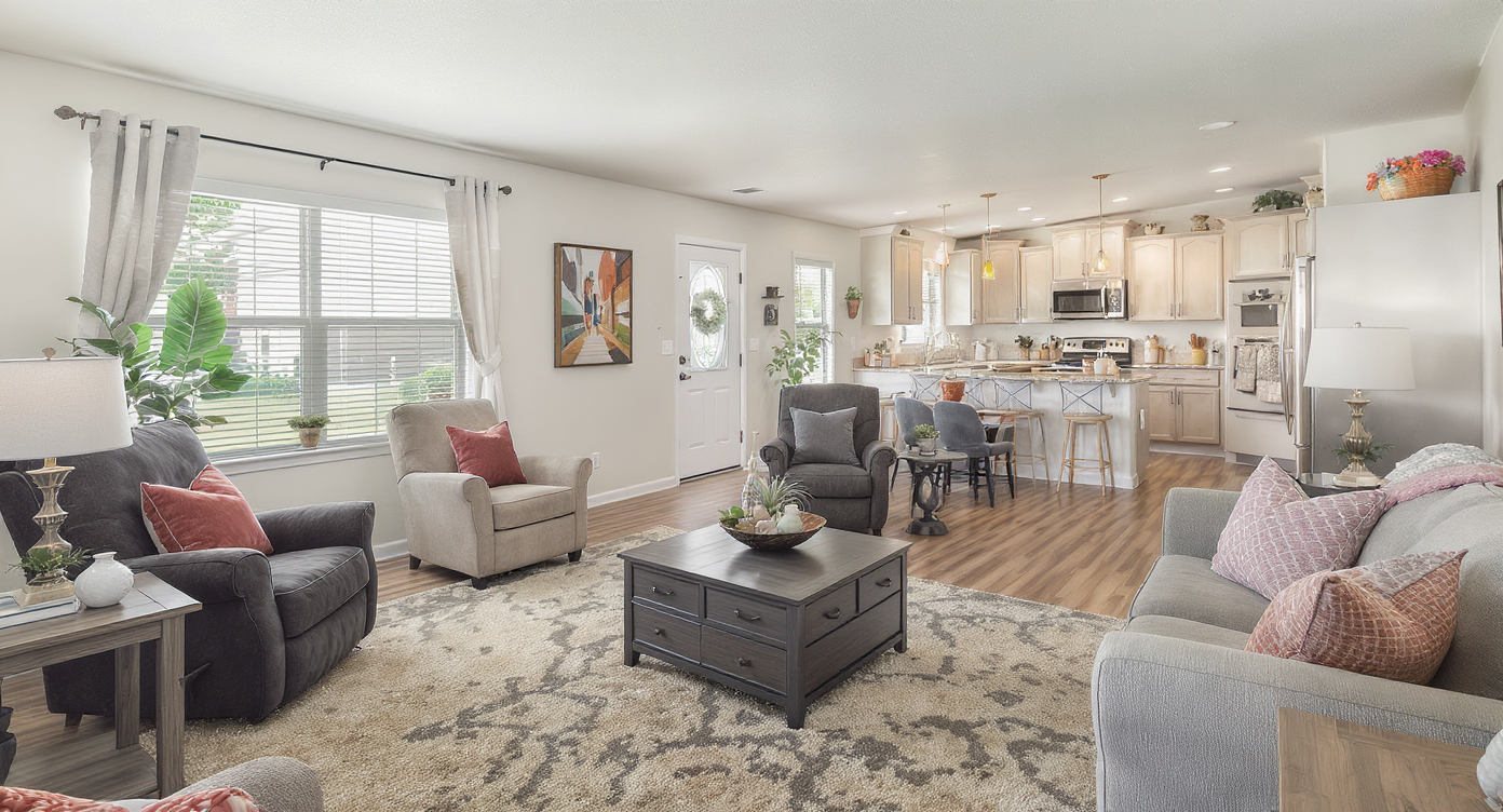 A flexible living space in a manufactured home, displaying versatile furniture arrangements for various needs.