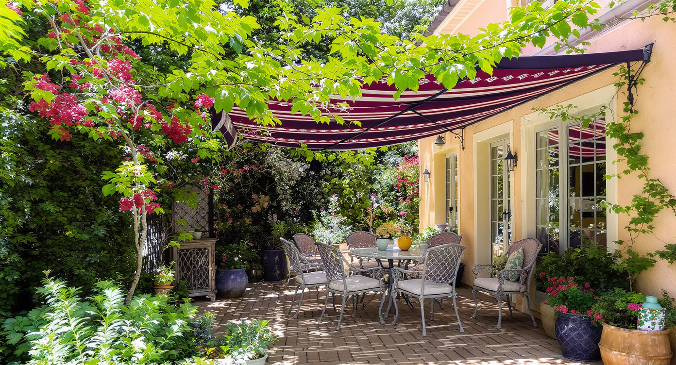 A patio with awnings and trellises creating a shaded outdoor space.