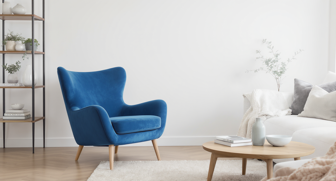 A stylish blue accent chair in a mostly white living room, showcasing color contrast and flexibility.