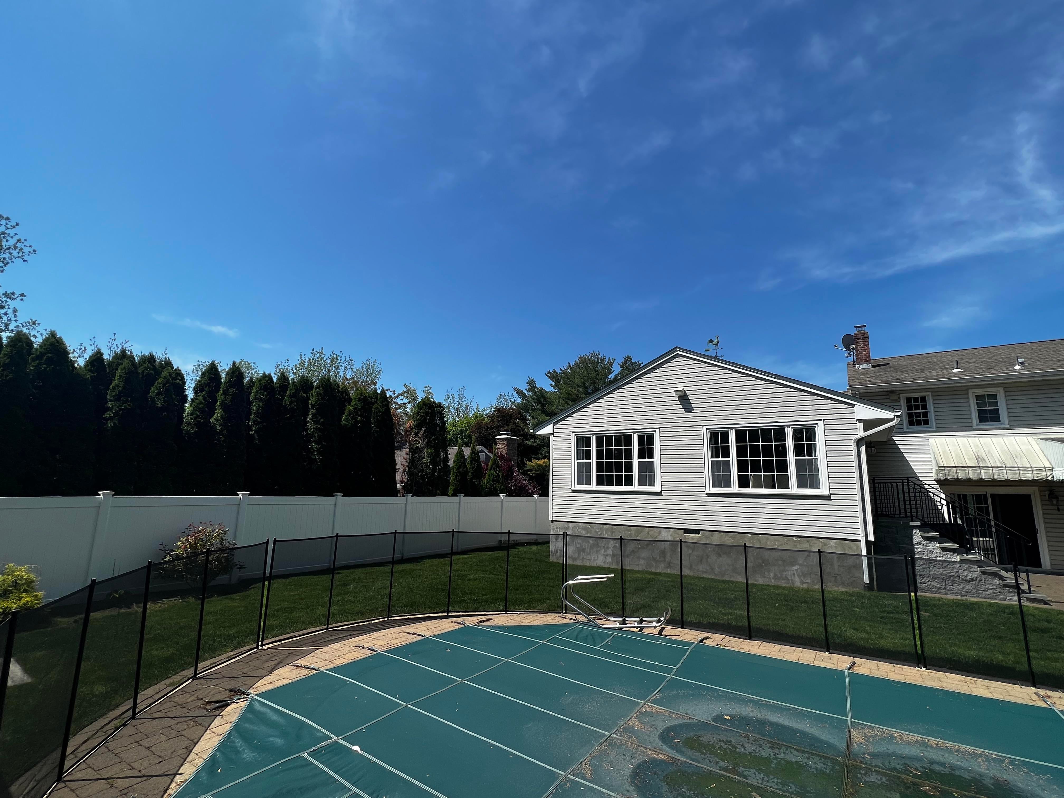 Layered privacy planting along a fence