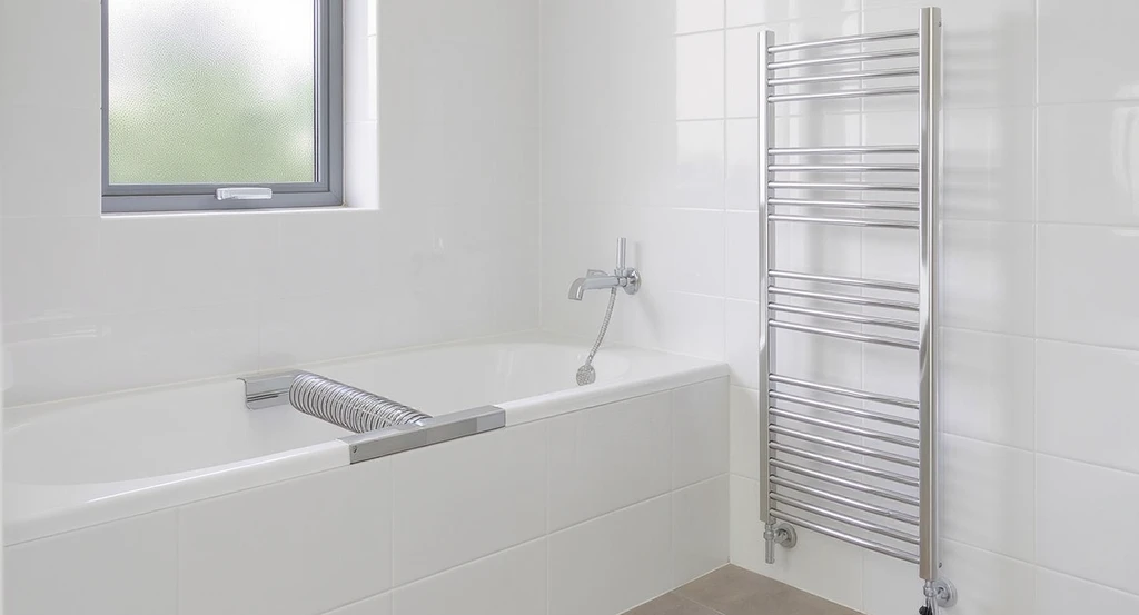 Modern bathroom illustrating how to heat an empty bathroom efficiently with the best safe heaters, showing a UL-rated panel heater properly installed away from water sources and drafty windows and doors sealed for insulation, exemplifying layout tips for warmer bathroom spaces.