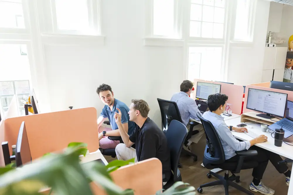 The Neople team at work in the office