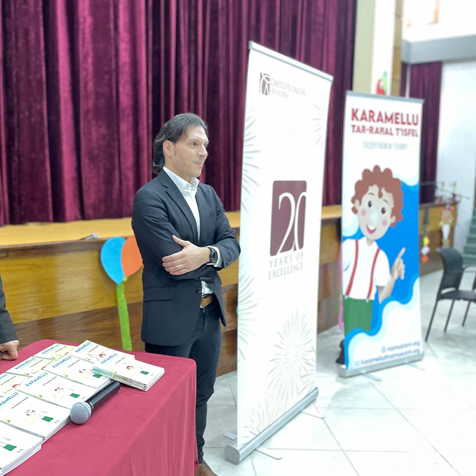 Chetcuti Cauchi donates books in Maltese language to a local primary school
