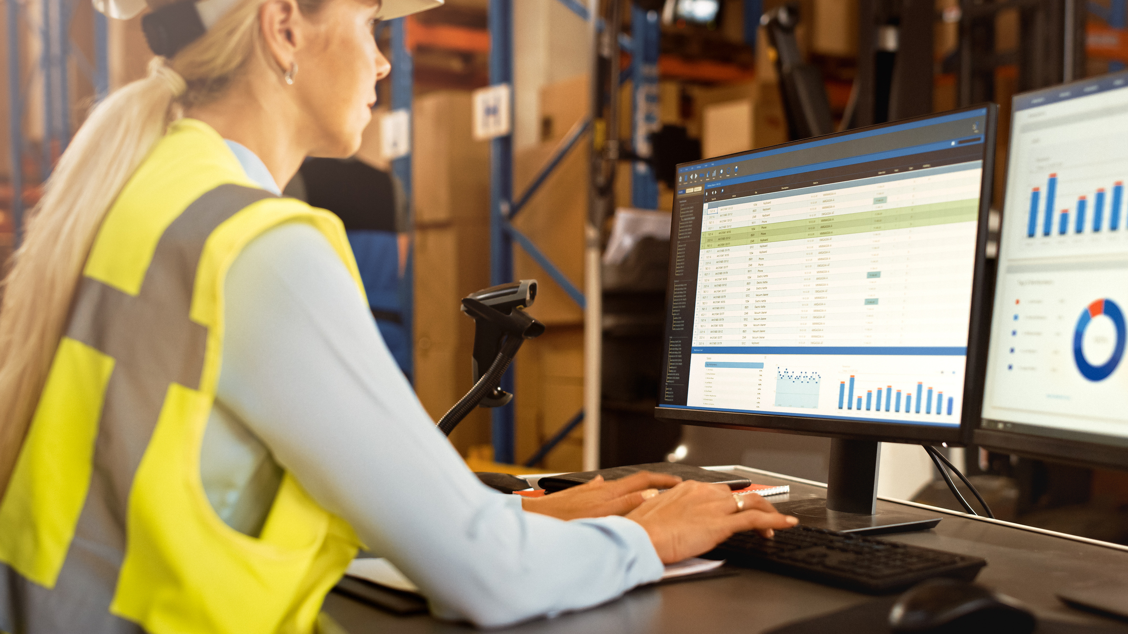 warehouse operative working at a WMS terminal