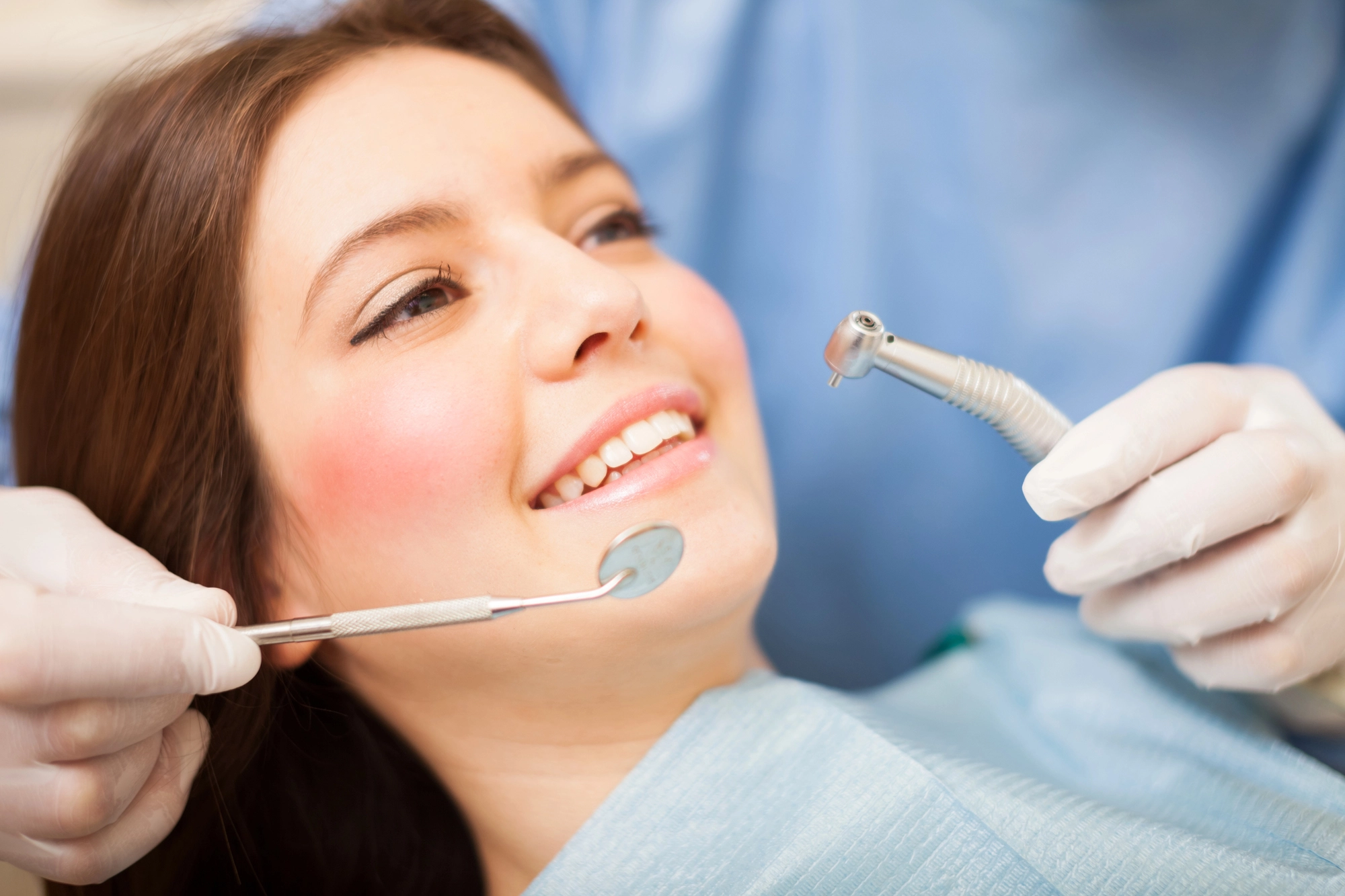 patient getting permanent dental implants 
