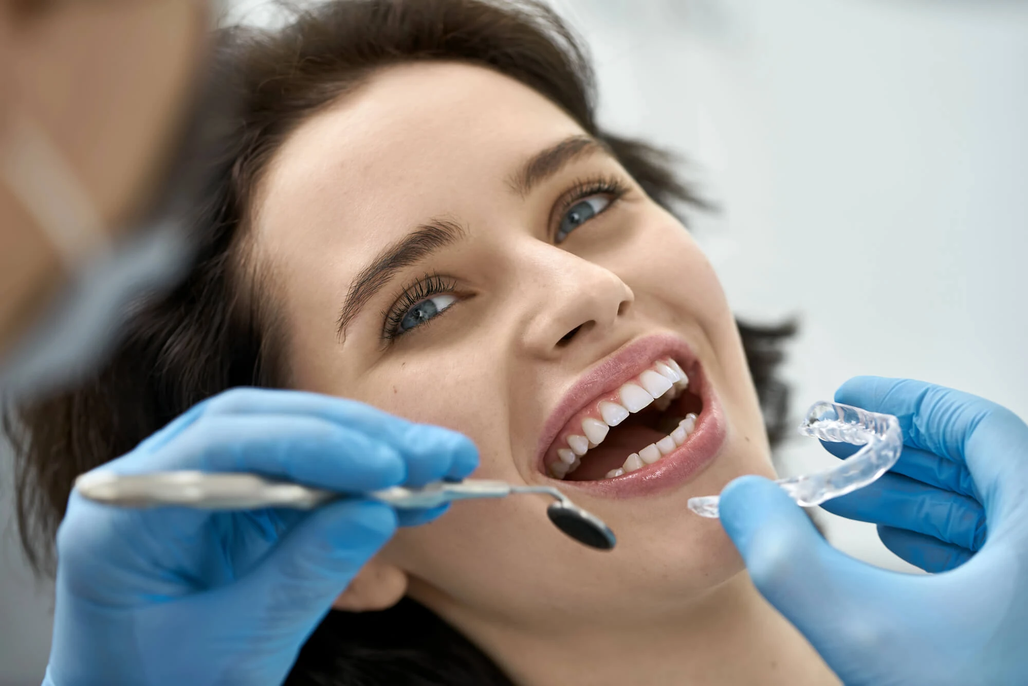 Patient receiving a dental appliance evaluation as part of full mouth reconstruction care