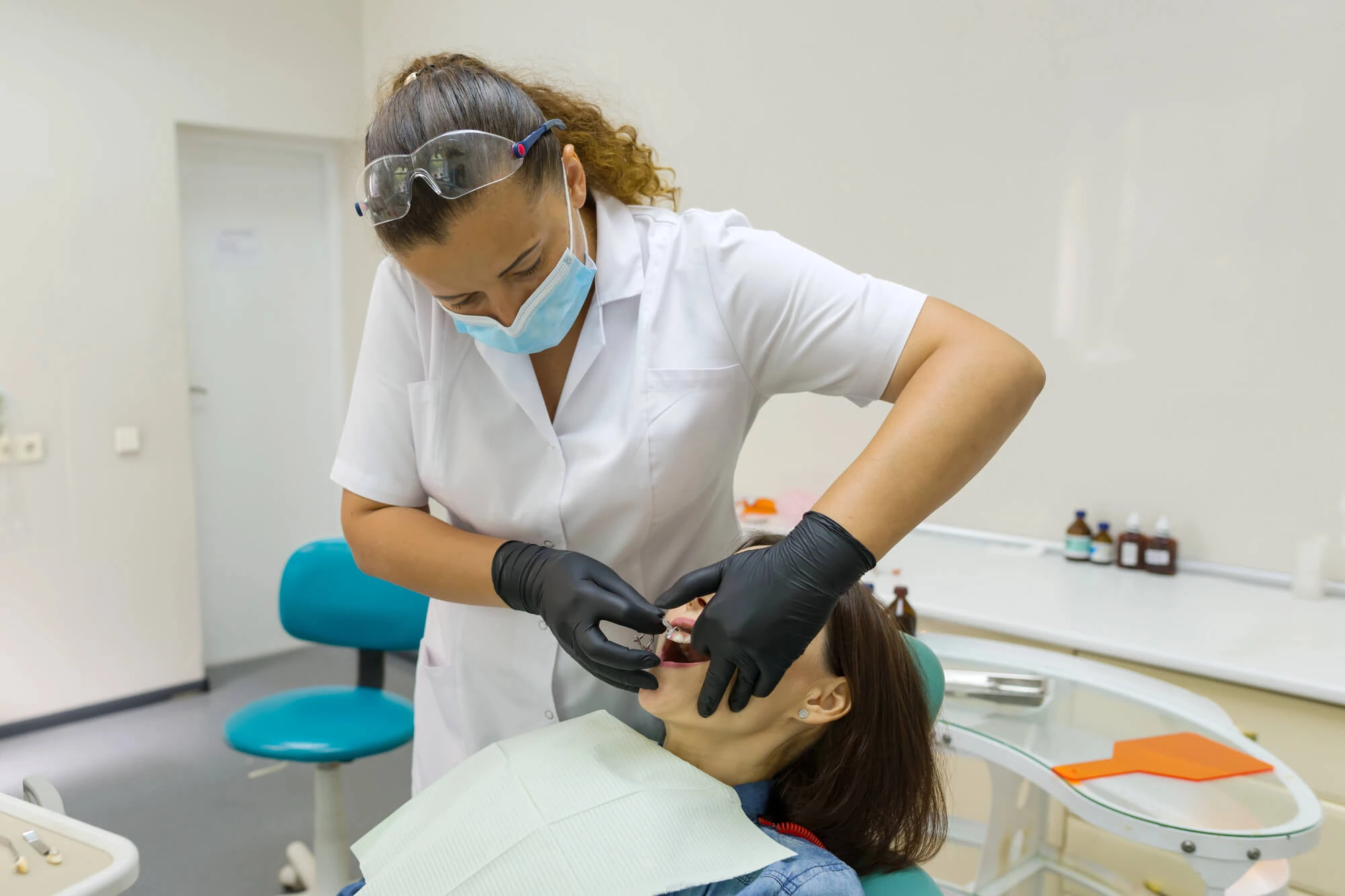 Dentist providing careful treatment for a patient using sedation dentistry in Lexington
