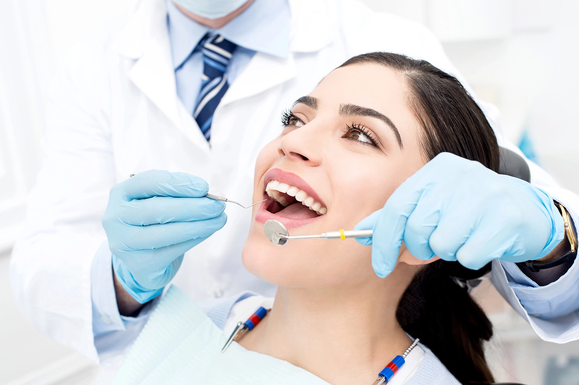 dentist-checking-Permanent-Dental-Implants
