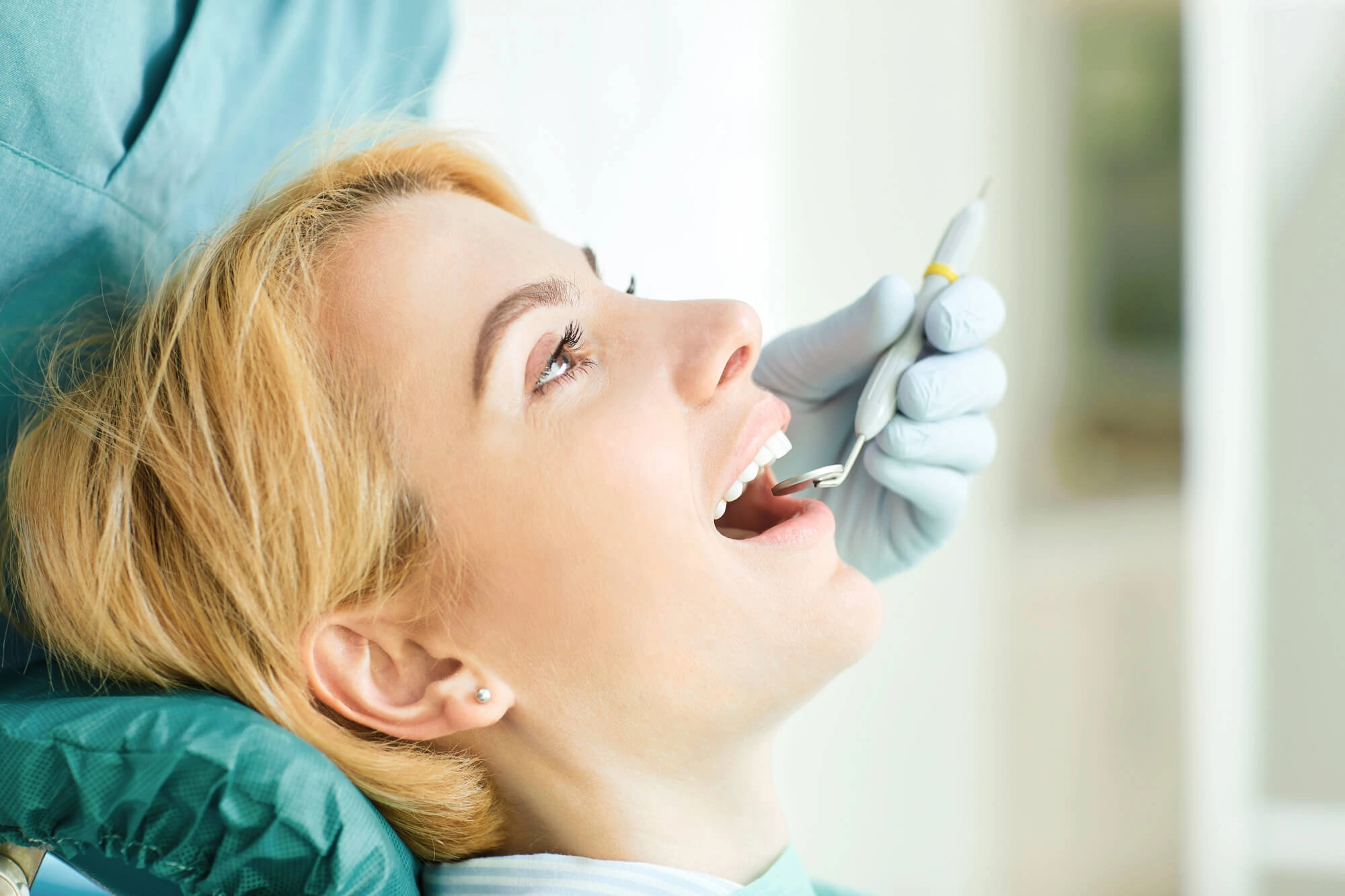 woman getting Permanent Dental Implants