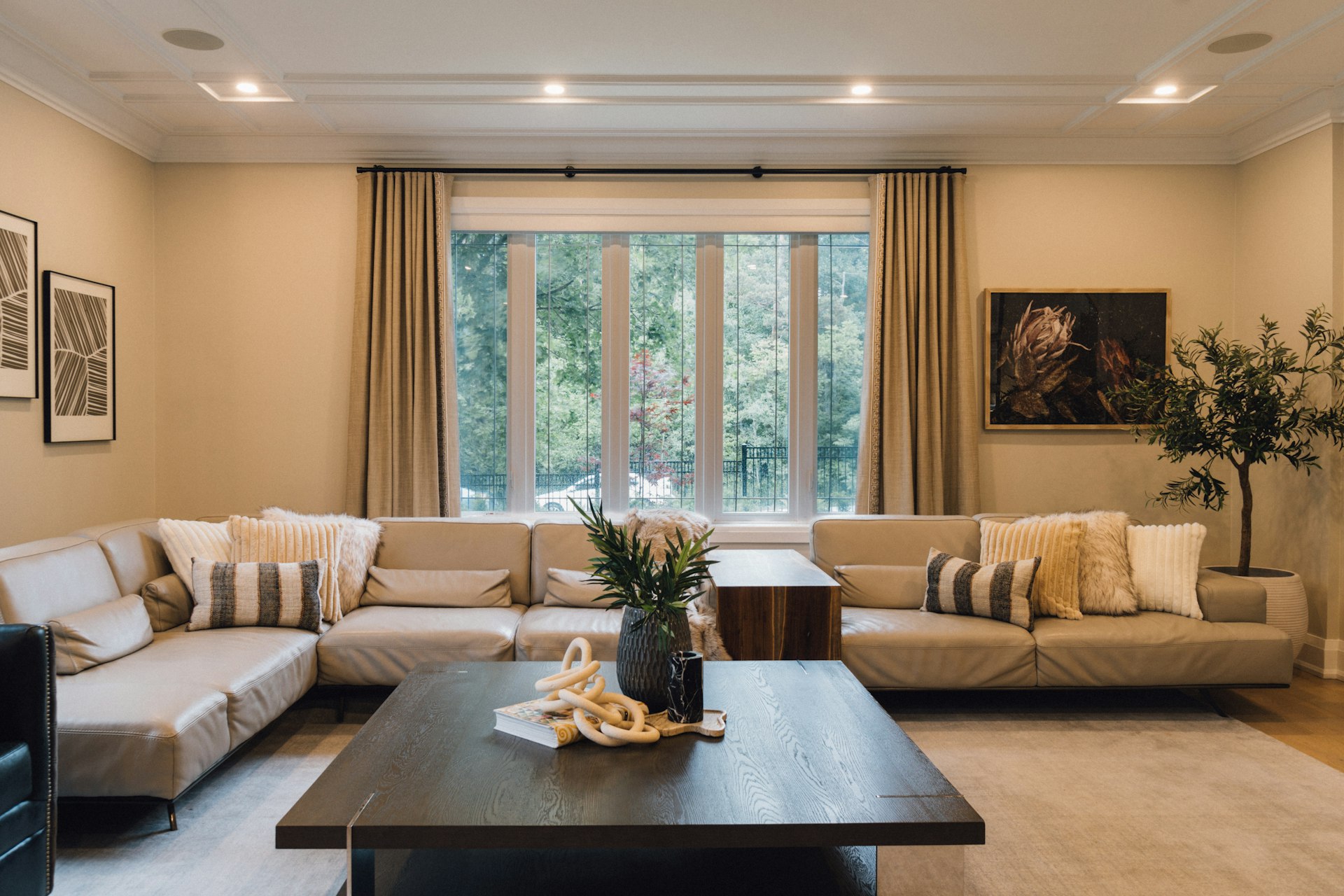 A furnished living room with a large window