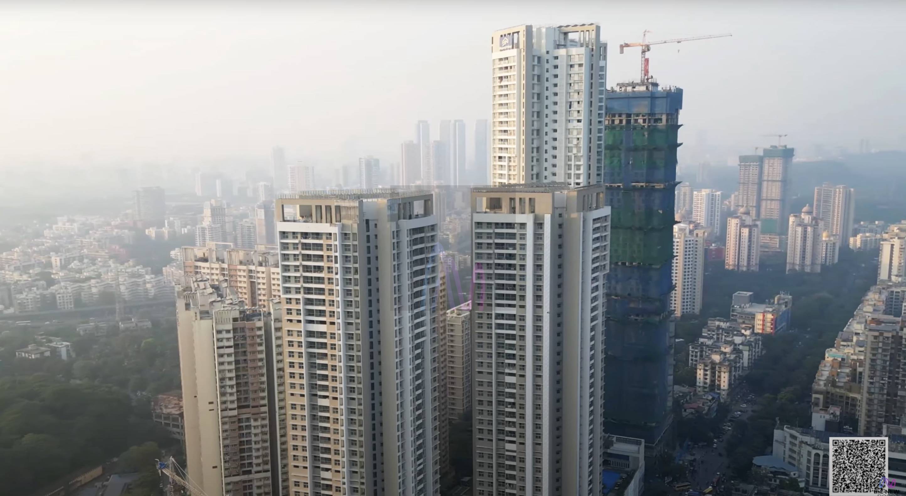 Residential towers in Mumbai's suburbs, with one tower still under construction