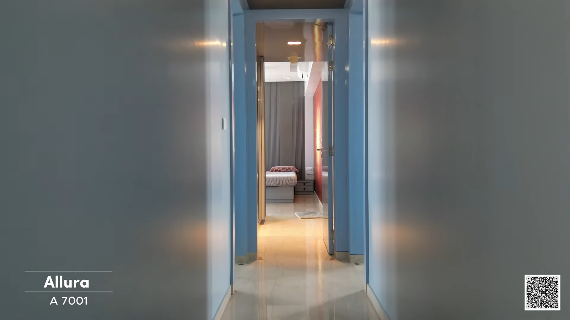 A corridor leading to a bedroom inside a Mumbai apartment