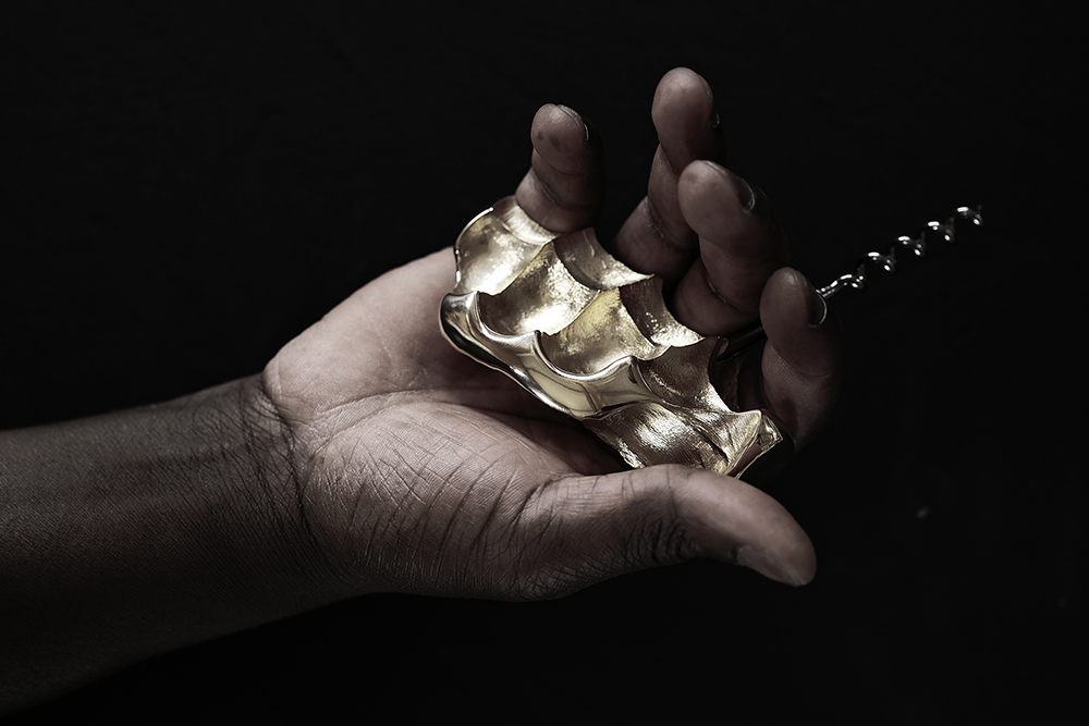 Transmission entre générations autour d’une œuvre Forest Audiard (tire bouchon d'art) sculptée en bronze