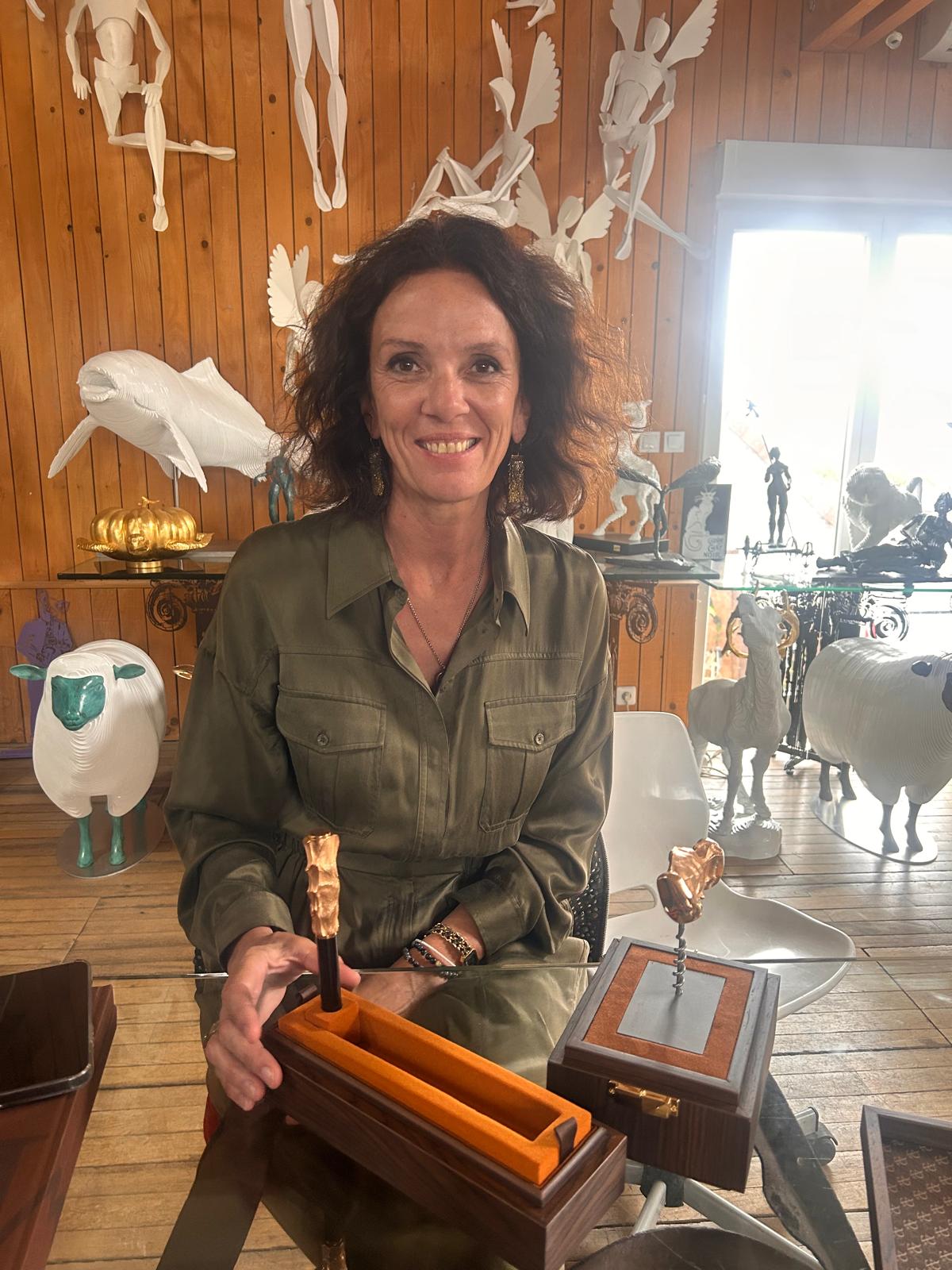 Anne Lejeune on the day she received her Forest Audiard Sculpted Pen and Corkscrew in rose gold bronze, at Michel Audiard’s art foundry.