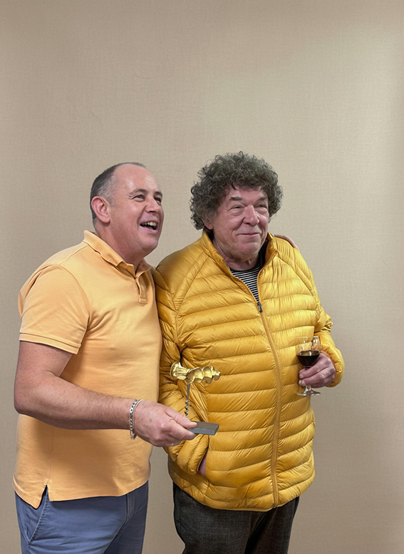 David Sauvagnac receiving his bespoke 24-carat yellow gold Forest Audiard Corkscrew from Michel Audiard himself.