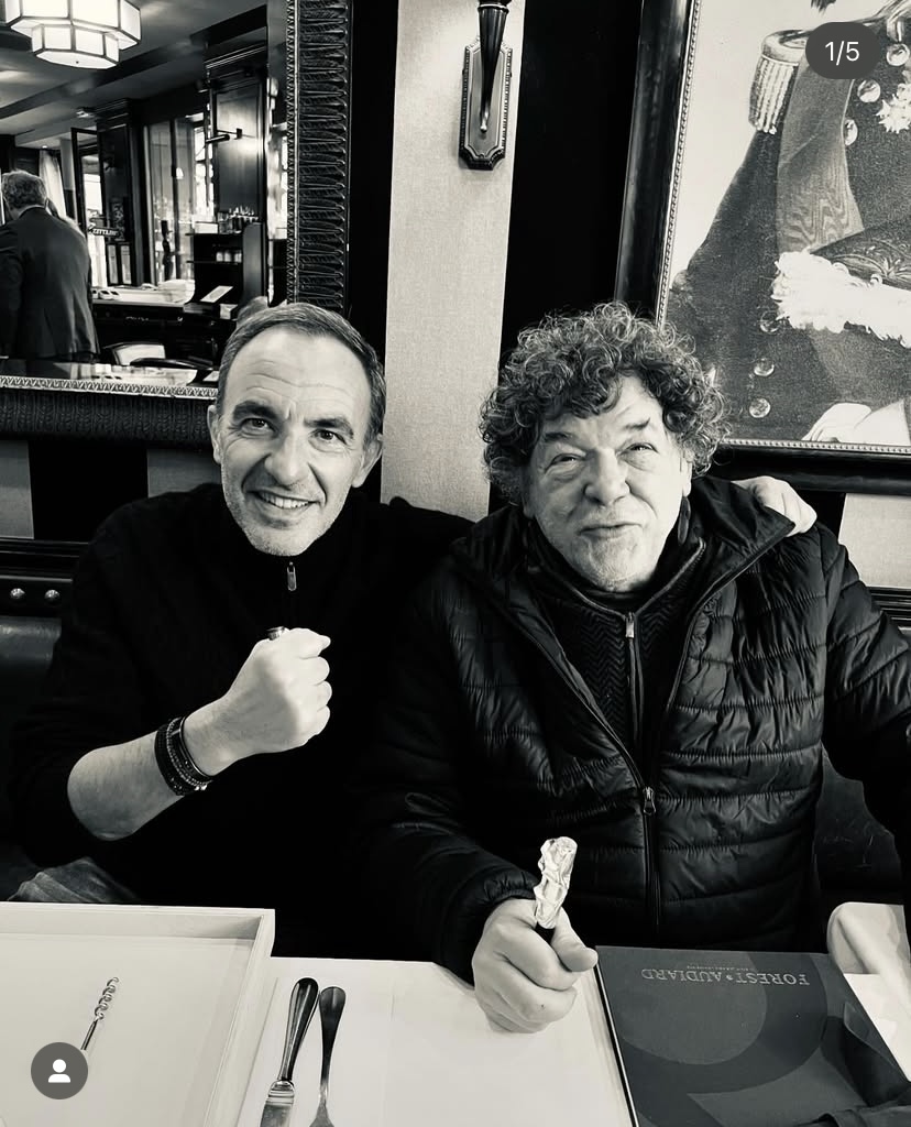 Nikos Aliagas having his handprint taken for his Sculpted Pen alongside Michel Audiard, co-founder of Forest Audiard.
