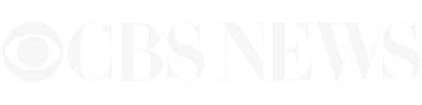 CBS News logo with an eye symbol and the text 'CBS NEWS' in uppercase letters.