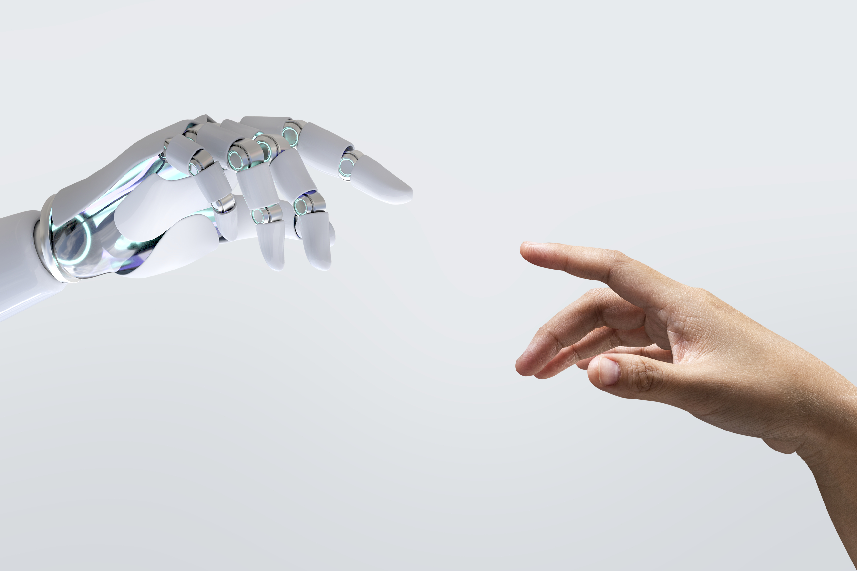 mains de robot et d'humain qui se tende pour presque se toucher