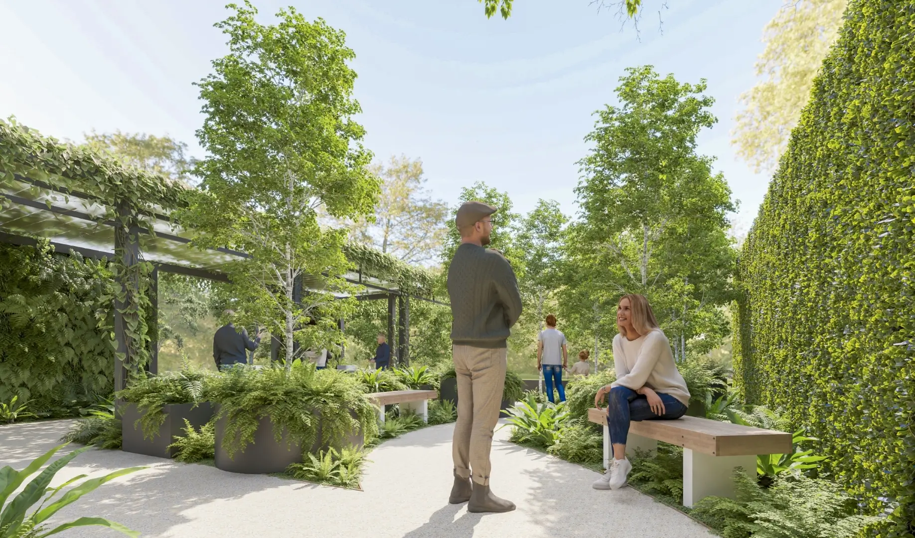 Lush green garden with people walking and sitting on wooden benches